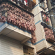 Illustration for article titled You Don't Want To Live Next to China's "Bacon Apartment"